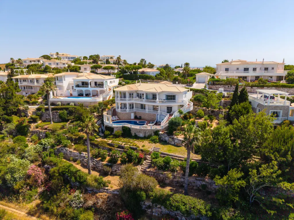 Non resident buyer reviewing mortgage documents for financing an Algarve property in Portugal.