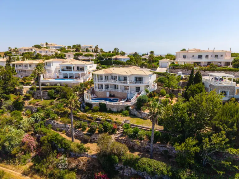 Non resident buyer reviewing mortgage documents for financing an Algarve property in Portugal.